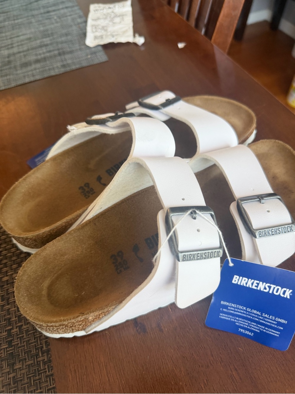 Birkenstock White Two-Strap Arizona Sandals with Silver Buckles